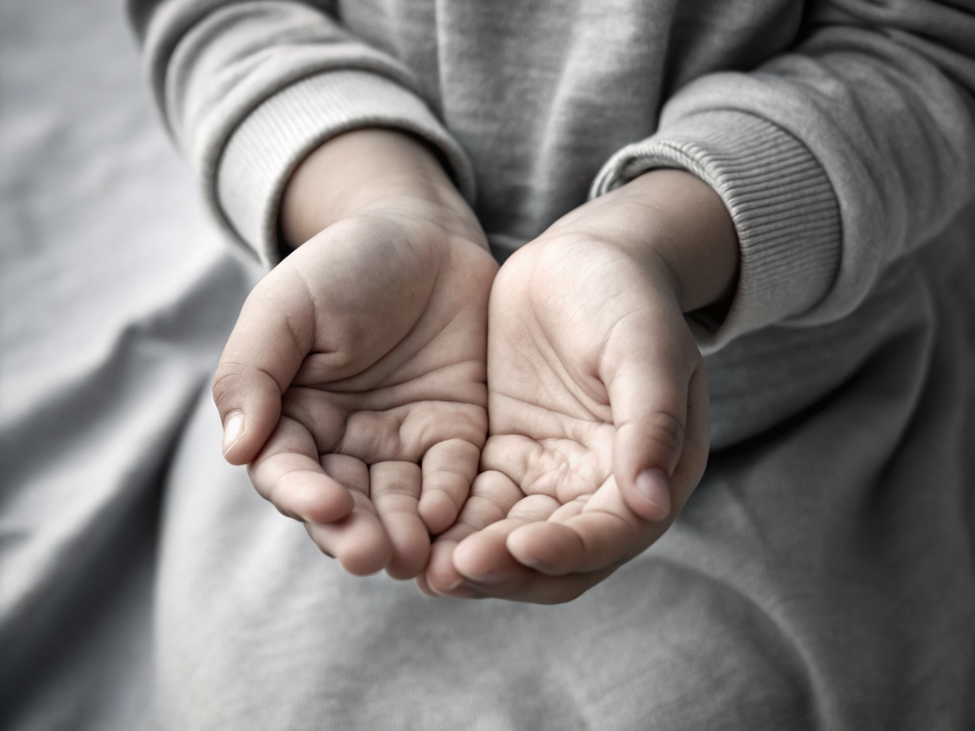 Close up of hands in a meditative gesture